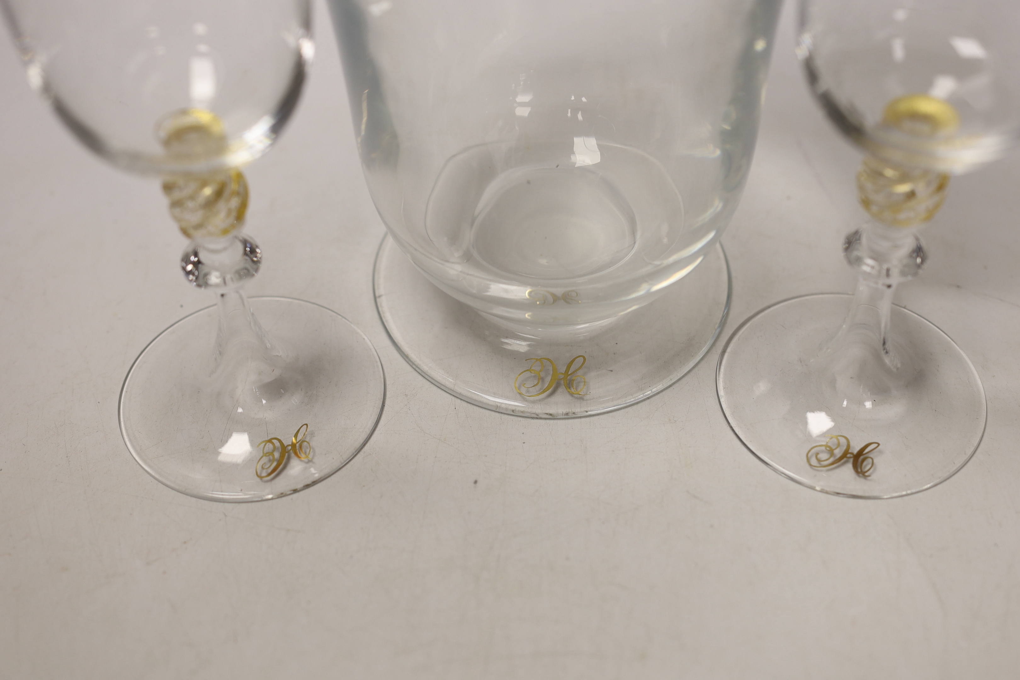 A Venetian glass decanter and two matching glasses, each with a gilt ‘H’ to foot. Tallest 32cm